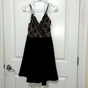 NWT black lace and nude Francesca’s dress size medium